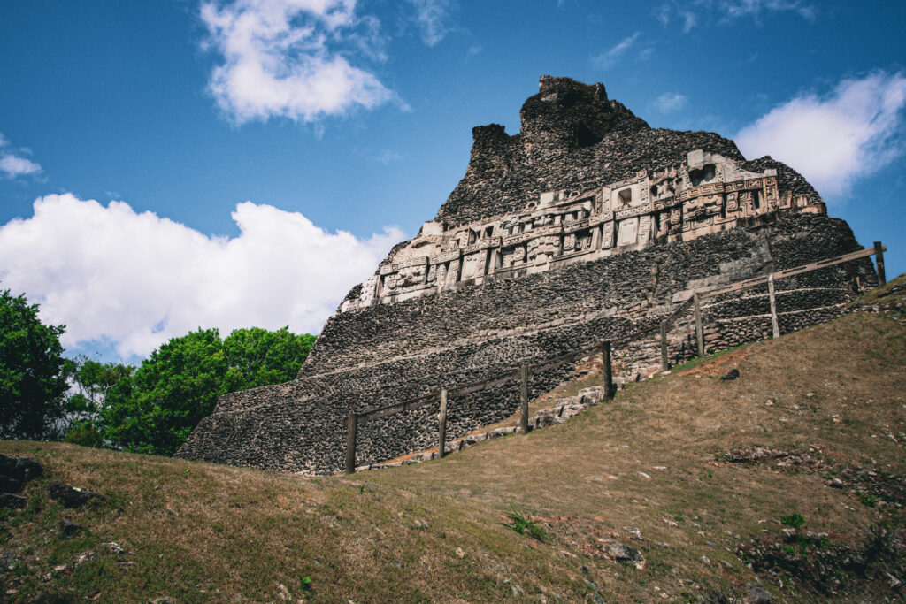 Ancient carved frieze on El Castillo pyramid at Xunantunich Maya ruins in Belize
